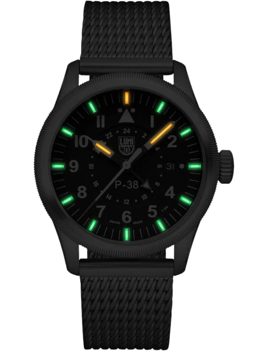 Night view of Luminox wristwatch featured in stainless steel, quartz movement with GMT, black dial, stainless steel bracelet.