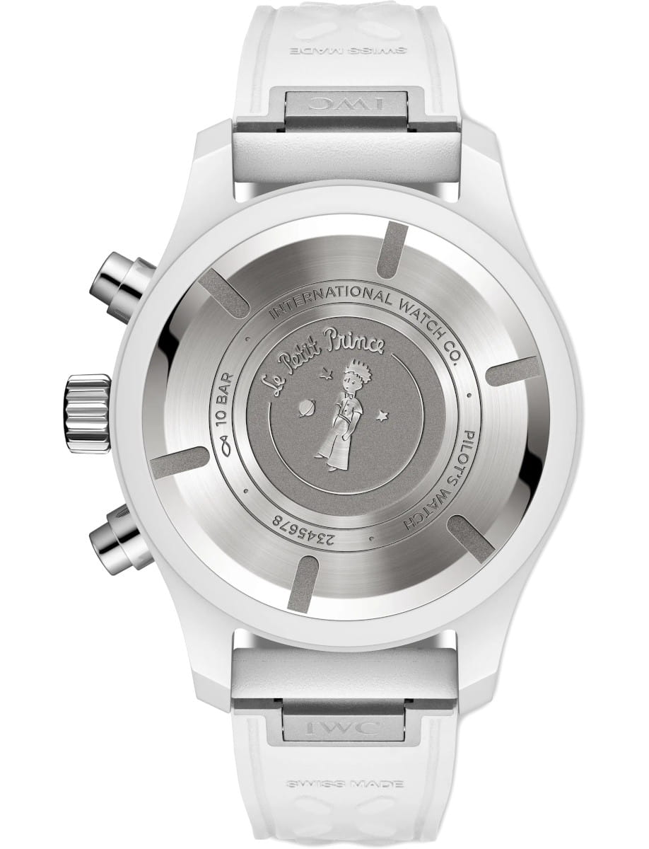 Back view of IWC Pilot's Watch Chronograph 41 Le Petit Prince wristwatch with ceramic case, blue dial, and white rubber strap.