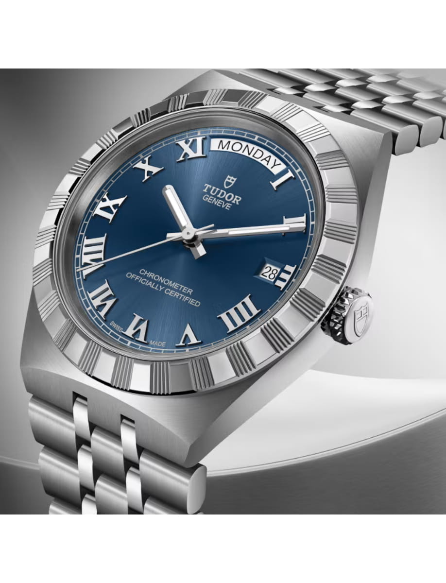 Side view of Tudor wristwatch with stainless steel case and bracelet and blue dial