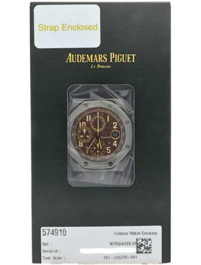 Box view of Pre-owned Audemars Piguet Royal Oak Offshore Chronograph wristwatch with stainless steel case, brown dial, and brown leather strap.