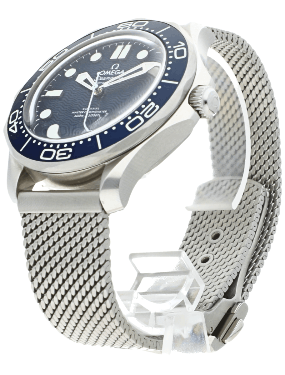 Front left side view of Pre-Owned Omega Seamaster Diver 300m James Bond 60th Anniversary wristwatch with stainless steel case and bracelet, and blue dial.