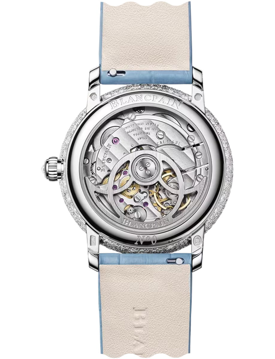 Back view of Blancpain Ladybird Colors Phases de Lune wristwatch with white gold case, white mother-of-pearl dial set with diamonds, and blue leather strap.