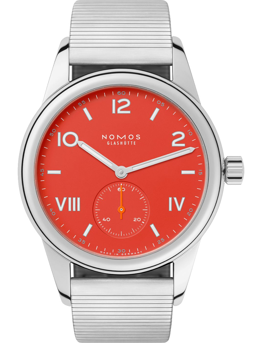 Nomos wristwatch with stainless steel case, red dial, and stainless steel bracelet.