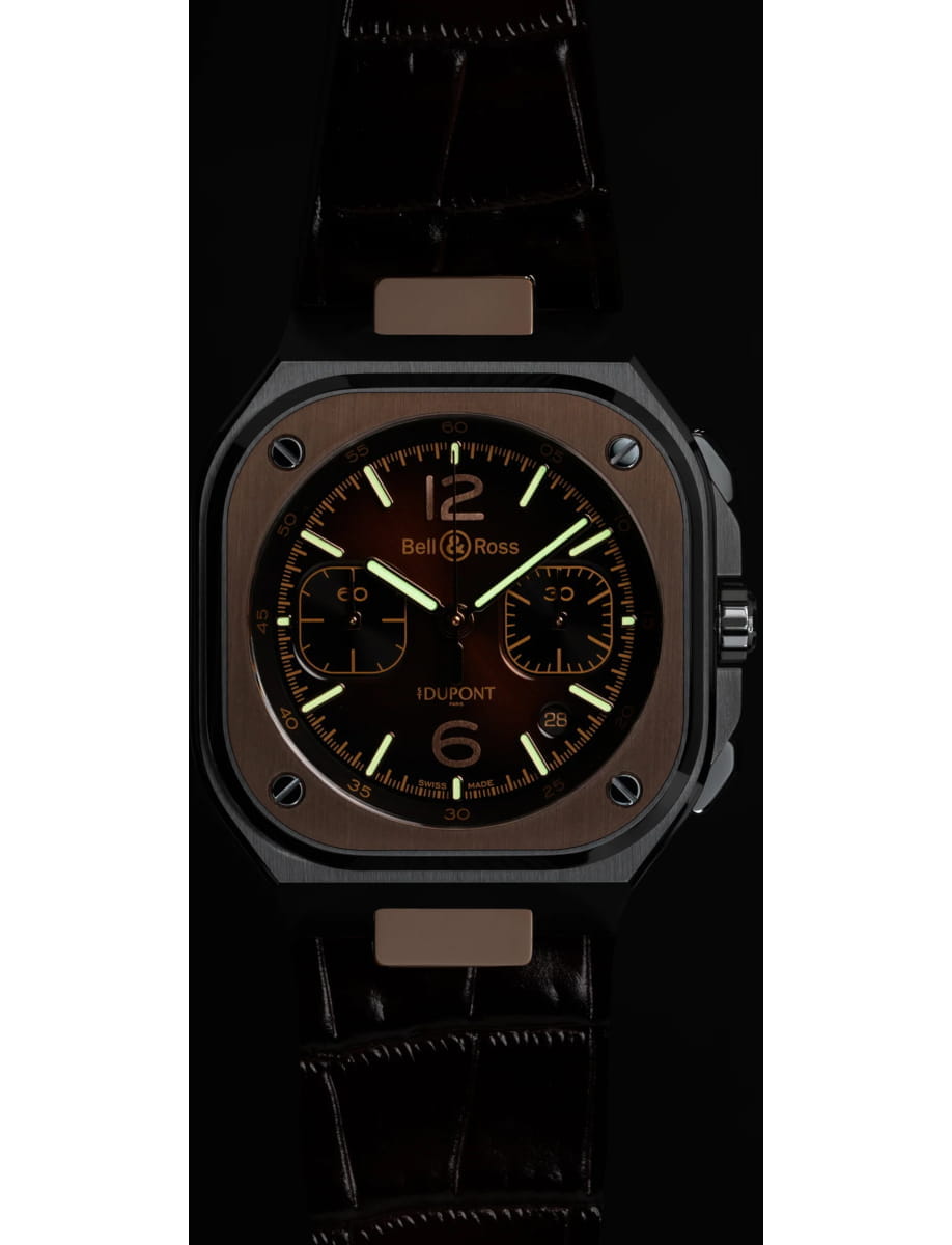 Night view of Bell&Ross wristwatch with steel and 18k rose gold case, sunburst brown dial and brown calfskin leather strap