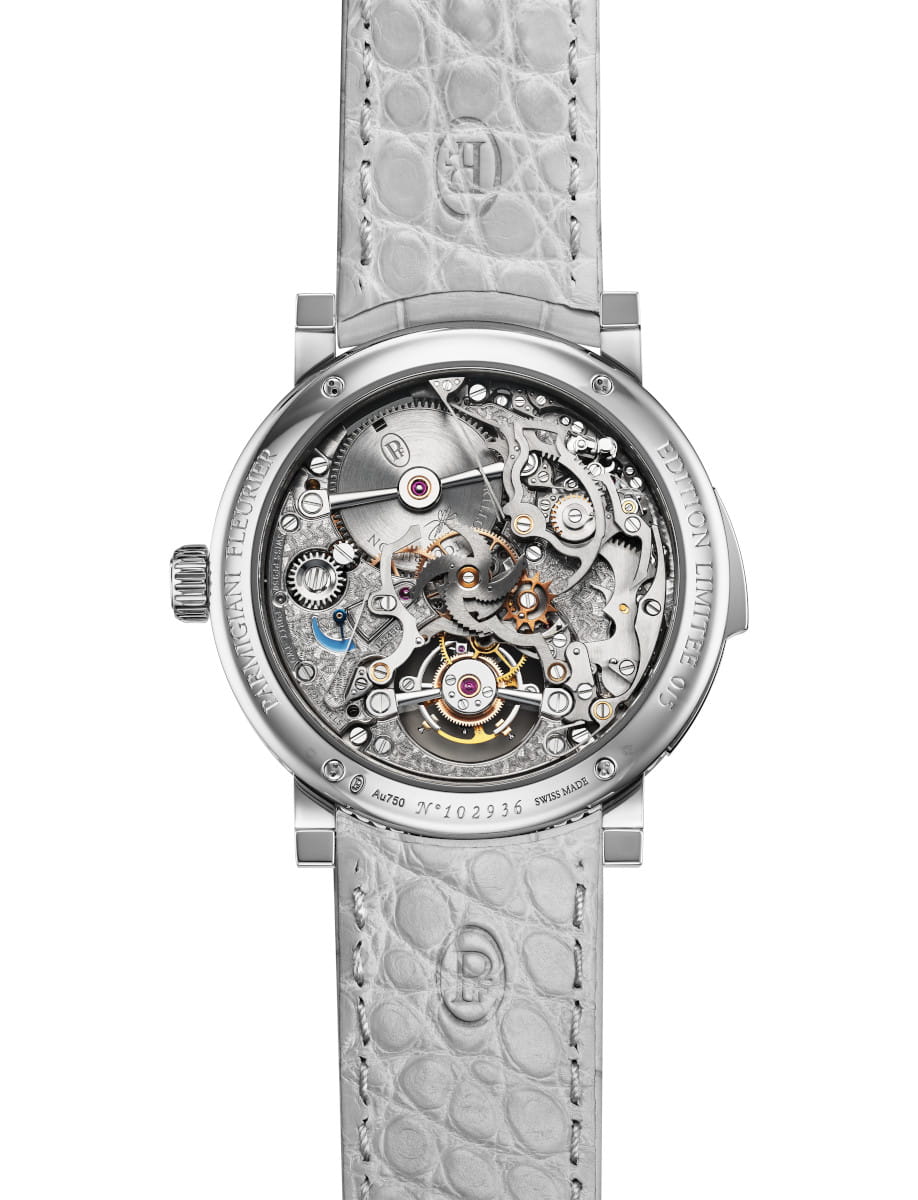 Back view of Parmigiani Fleurier Carillon Tourbillon 30th Anniversary with 18k white gold case, morning blue dial, and Akoya Grey alligator leather strap.