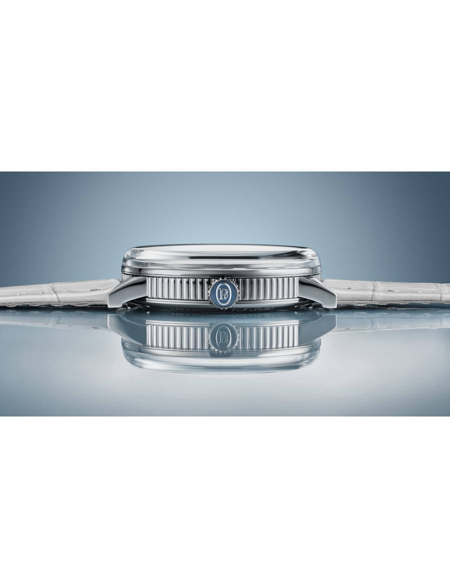 Right side view of Parmigiani Fleurier Carillon Tourbillon 30th Anniversary with 18k white gold case, morning blue dial, and Akoya Grey alligator leather strap.