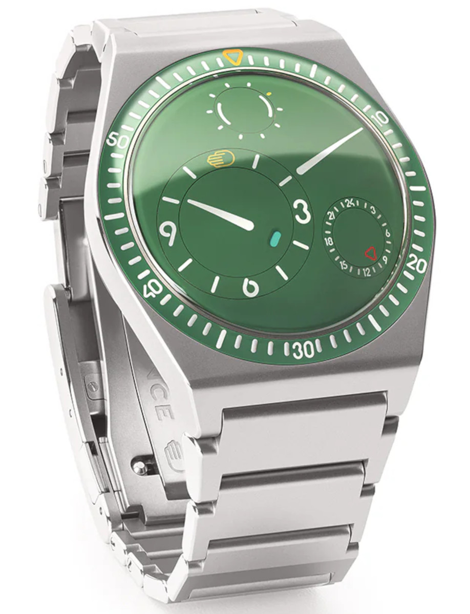 Side view of Ressence TYPE 7 B wristwatch with Grade 5 titanium case and bracelet, and green dial.