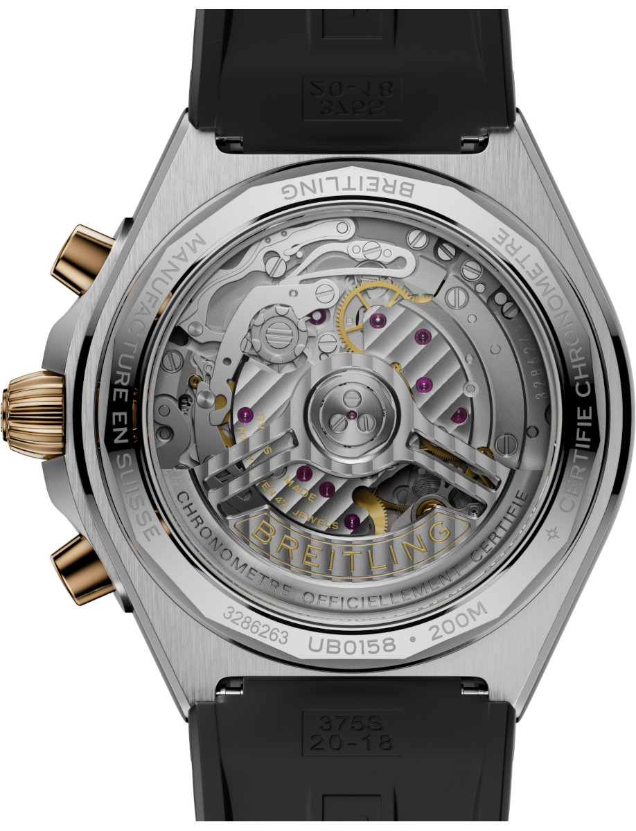 Back view of Breitling Chronomat B01 42 wristwatch with stainless steel case and 18k red gold bezel, black rubber strap, and anthracite panda dial.