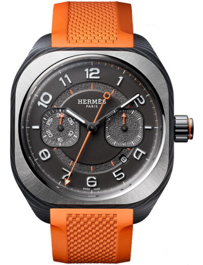 Hermes wristwatch with carbon fiber composite case, black gold treated and blackened dial, and orange rubber strap.