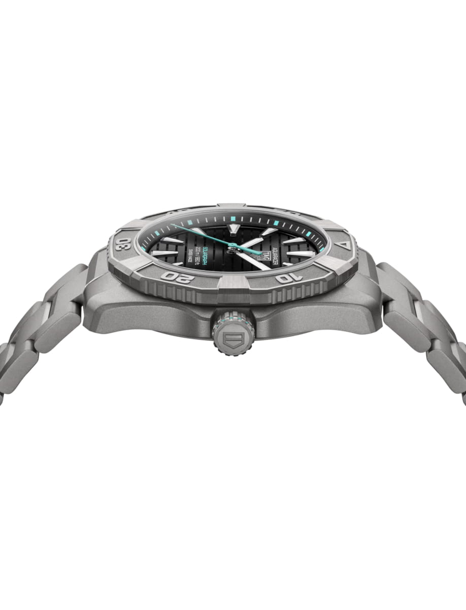 Side view of TAG Heuer wristwatch with titanium case and bracelet and black dial