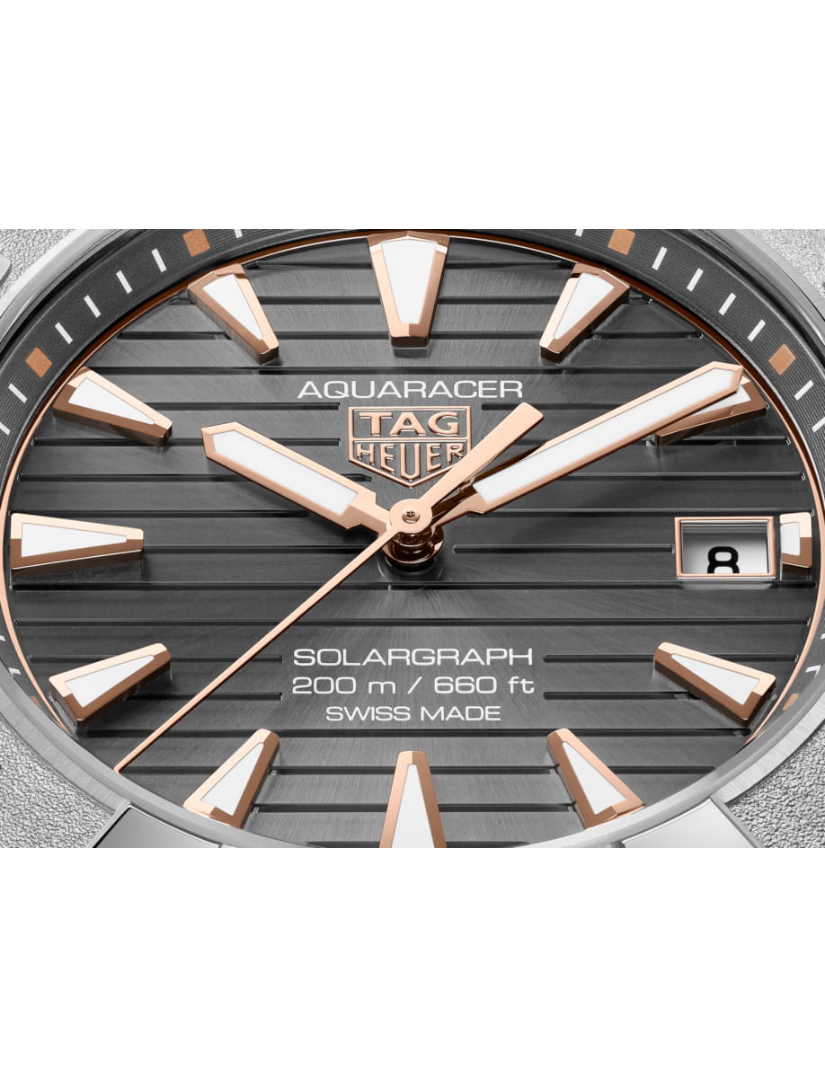 Close view of TAG Heuer wristwatch with titanium case and bracelet and grey dial