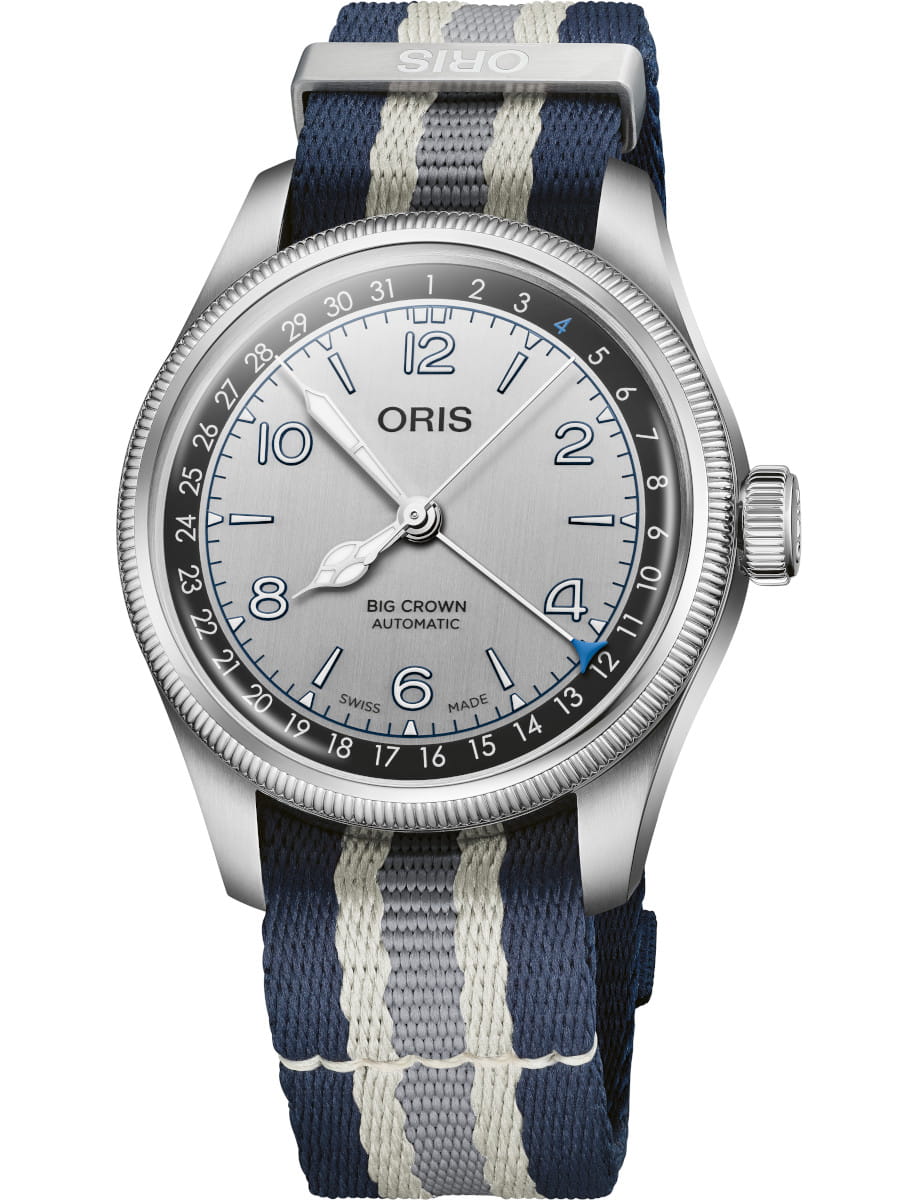Oris Lou Gehrig Limited Edition wristwatch with stainless steel, silver dial, and blue, white and grey NATO fabric strap.