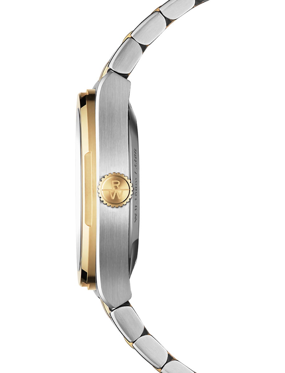 Side view of Raymond Weil A.R.T. wristwatch with stainless steel with yellow gold PVD plating case and bracelet, and metallic blue dial.