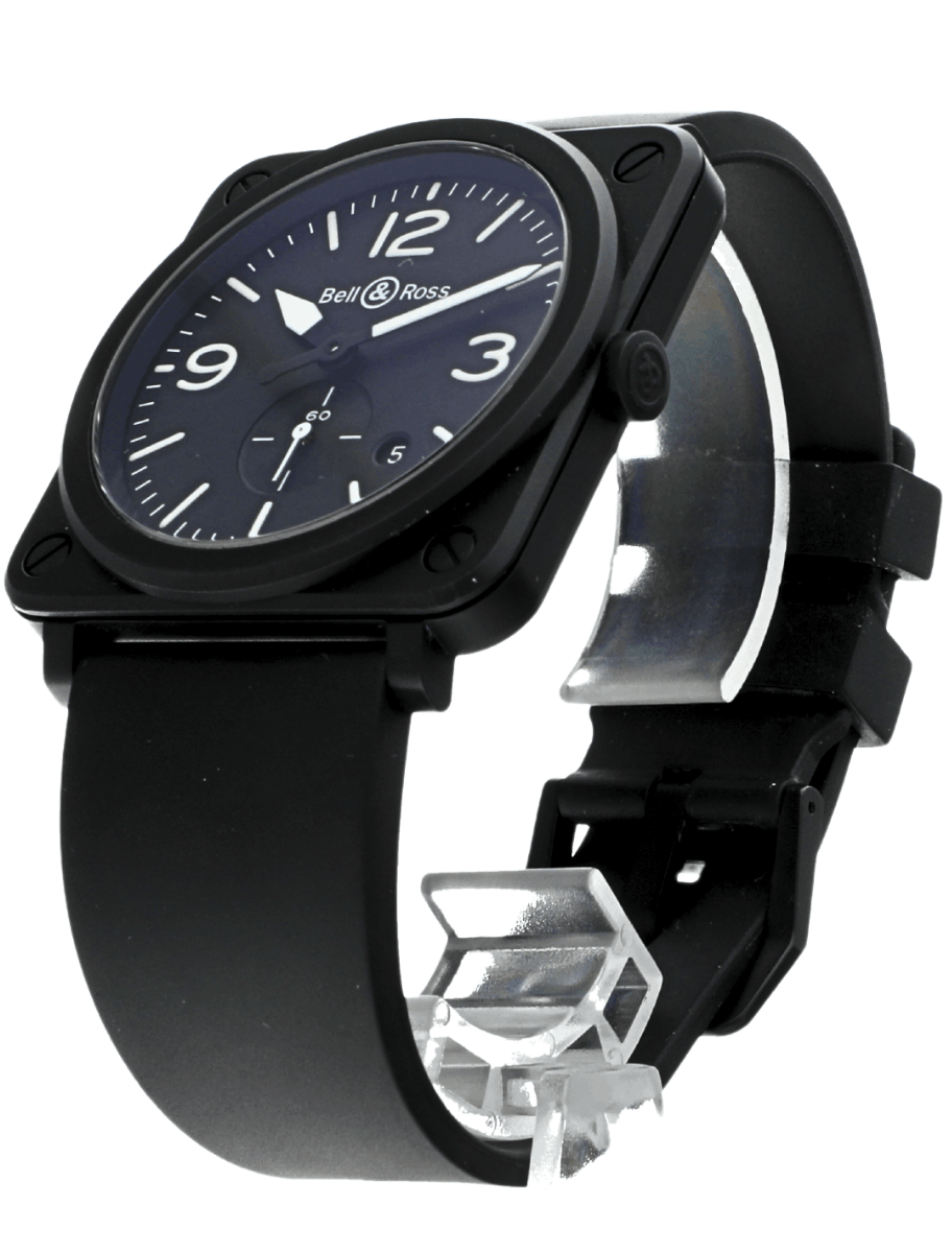 Front left view of pre-Owned Bell & Ross wristwatch with ceramic case, black dial, and black rubber strap.