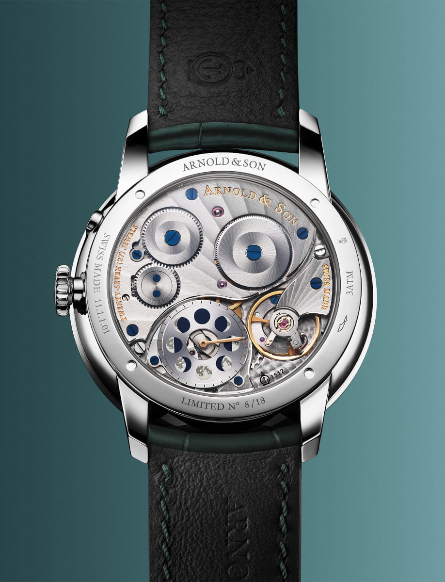 Back view of Arnold&Son Perpetual Moon wristwatch with stainless steel case, green dial, and green alligator leather.