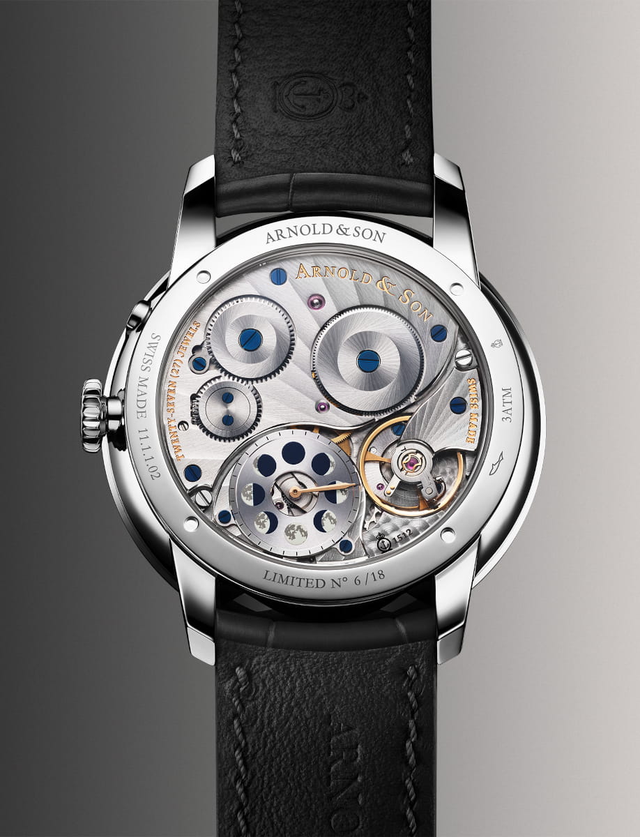 Back view of Arnold&Son Perpetual Moon wristwatch with stainless steel case, black dial, and black alligator leather.