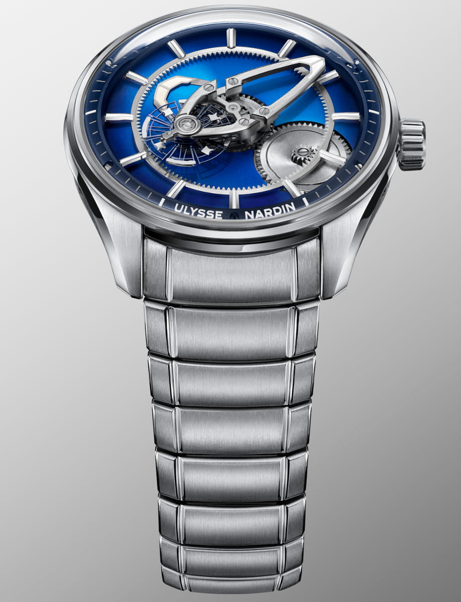 Front view of Ulysse Nardin Freak X wristwatch with stainless steel case and bracelet, and blue gradient dial.