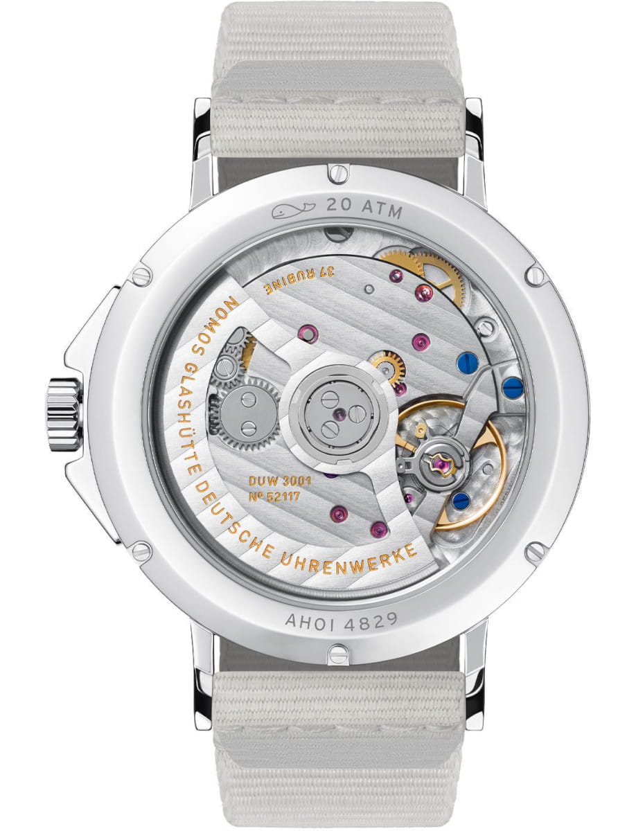 Nomos Ahoi Neomatik Sand wristwatch with stainless steel case and bracelet, and open caseback.