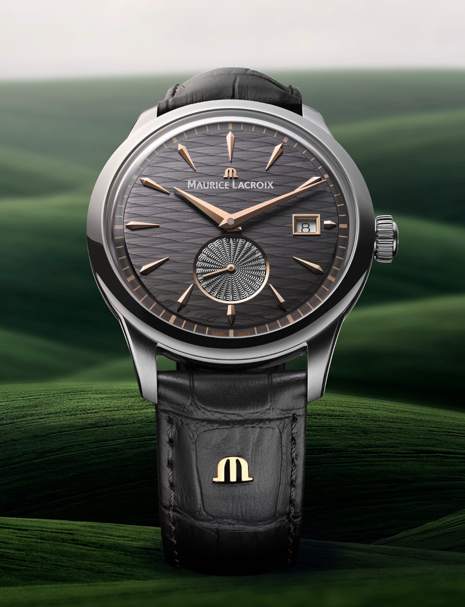 Front view of Maurice Lacroix 1975 Legacy wristwatch with stainless steel case, slate grey (gunmetal) dial, and black alligator-style leather strap with 4N “M” logo.