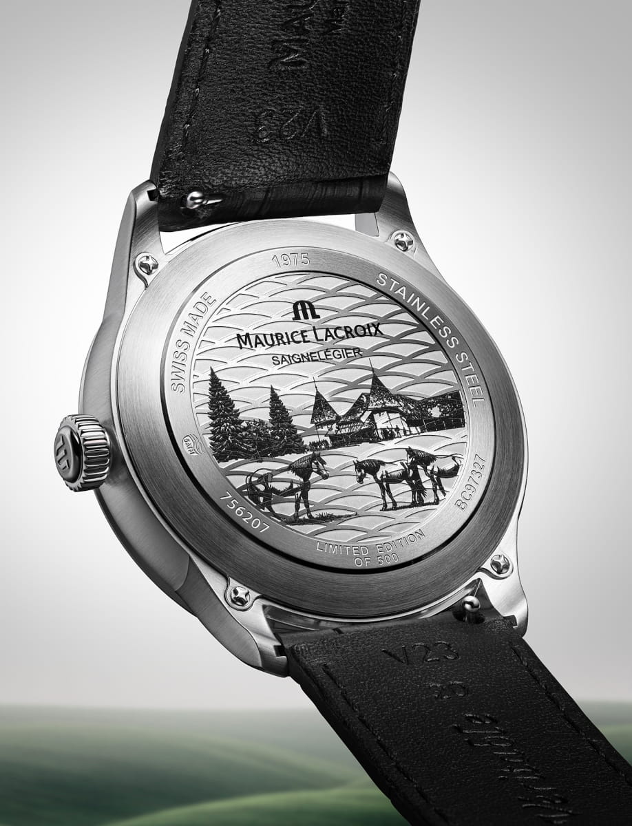 Back view of Maurice Lacroix 1975 Legacy wristwatch with stainless steel case, and black alligator-style leather strap with 4N “M” logo.
