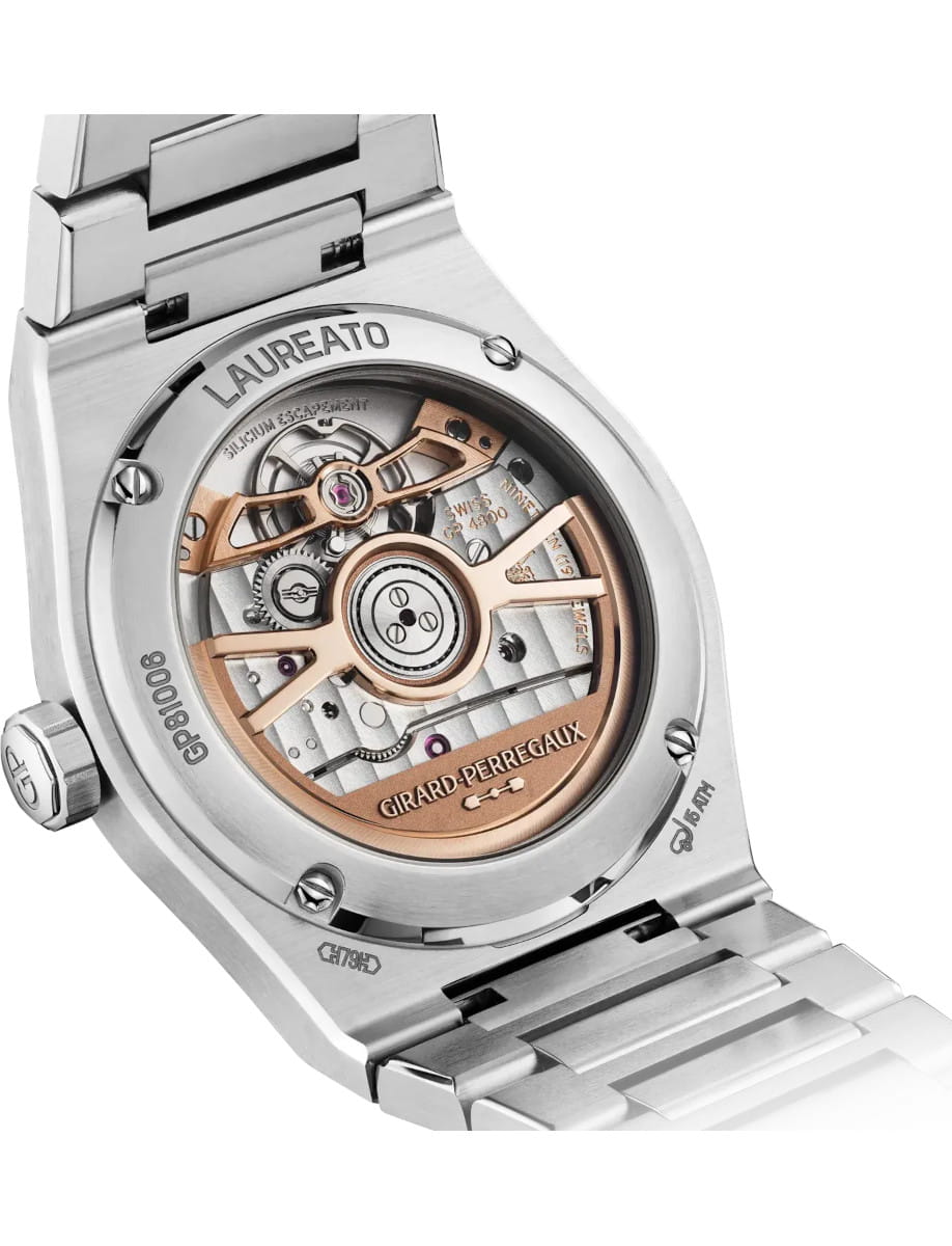 Back view of Girard Perregaux Laureato Fifty 36mm wristwatch with stainless steel case with diamond bezel and steel bracelet, and open case back.