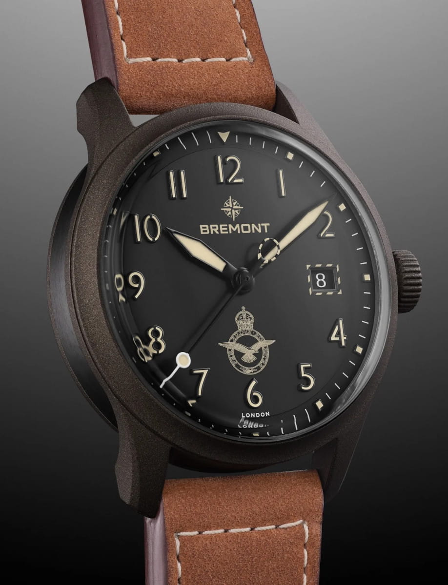 Side view of Bremont HMAF Altitude wristwatch with 904L Stainless Steel Trip-Tick case construction Coated With Cerakote Midnight Bronze, Black Galvanic metal dial, and Light Brown Nubuck Leather Strap.