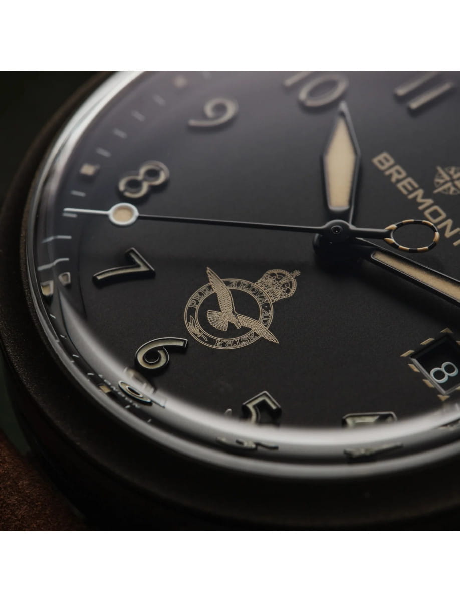 Close view of Bremont HMAF Altitude wristwatch with 904L Stainless Steel Trip-Tick case construction Coated With Cerakote Midnight Bronze, Black Galvanic metal dial, and Light Brown Nubuck Leather Strap.