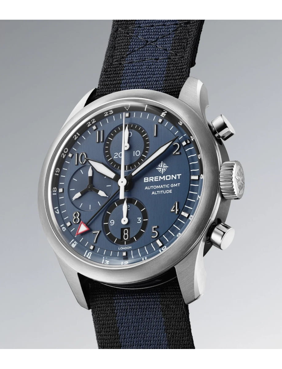 Side view of Bremont wristwatch with stainless steel case, blue dial and blue nato strap