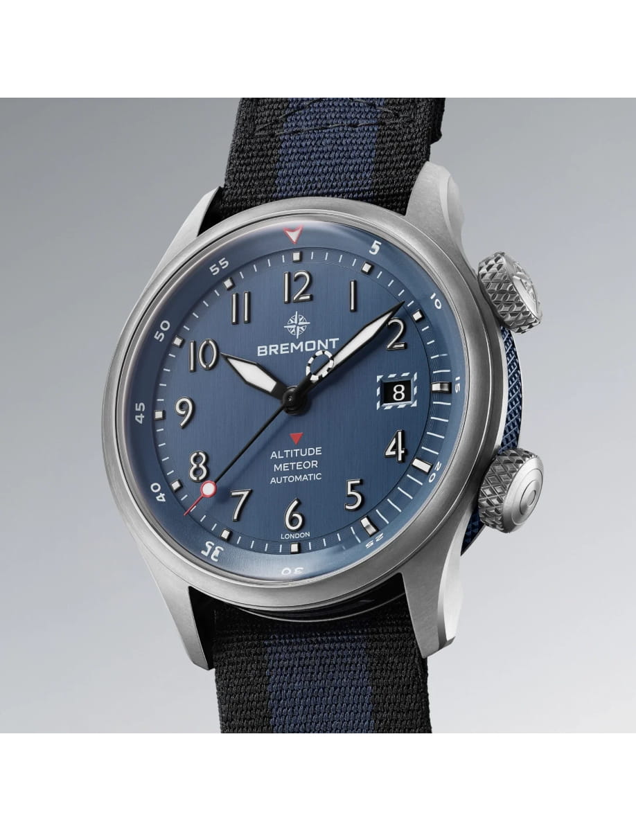 Side view of Bremont wristwatch with titanium case, blue dial and blue nato strap