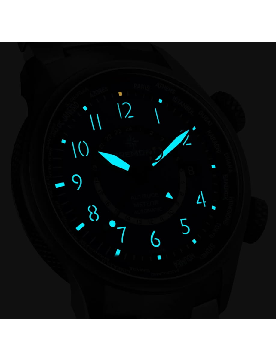 Night view of Bremont wristwatch with titanium case, blue dial, blue rubber and leather strap