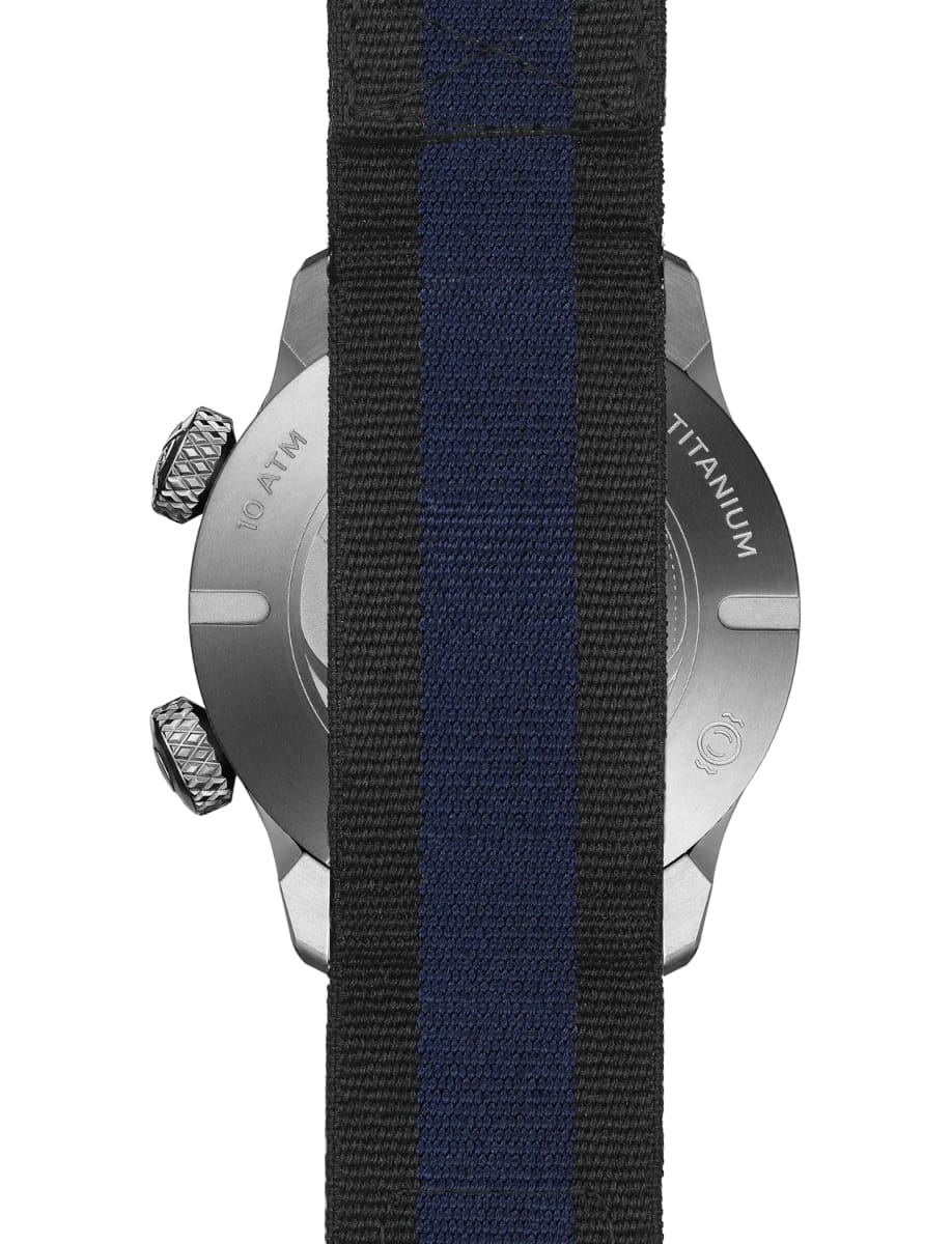 Back view of Bremont wristwatch with titanium case, blue dial and blue nato strap