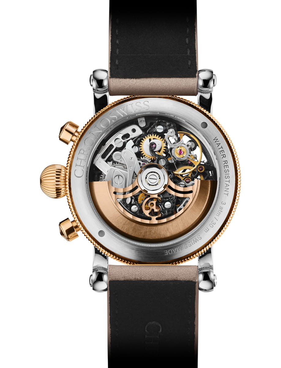 Back view of Chronoswiss Opus Chronograph Dakar wristwatch with stainless steel and 18k red gold case, skeletonized dial, and sand-colored Nubuck leather strap.