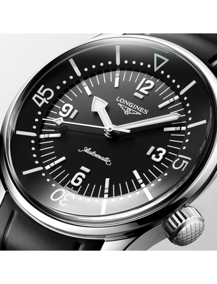 Close view of Longines wristwatch with stainless steel case, black dial and black rubber strap