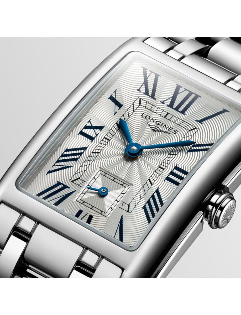 Close view of Longines wristwatch with stainless steel case and bracelet and silver dial