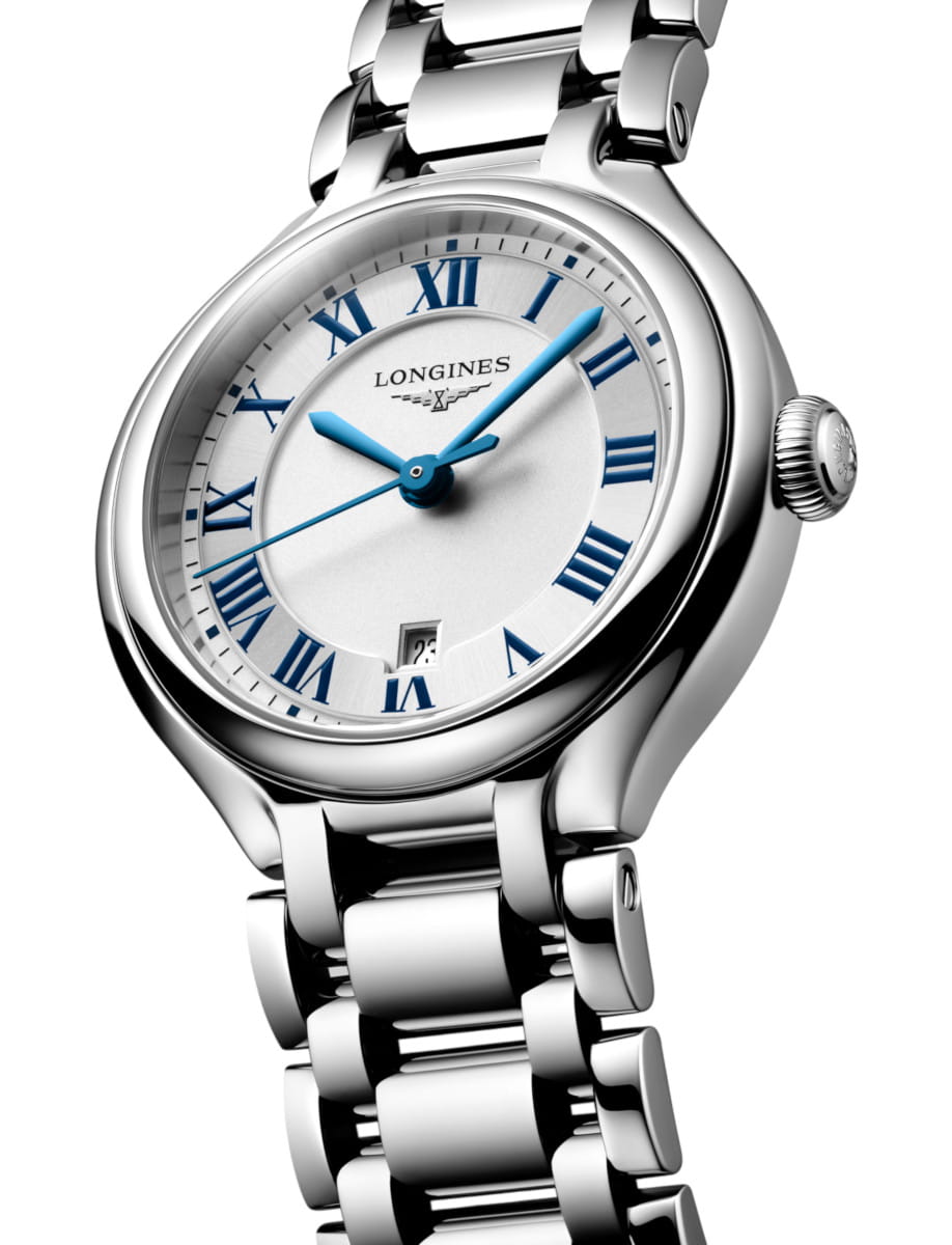 Side view of Longines PrimaLuna wristwatch with stainless steel case and bracelet, and sunray silver dial.