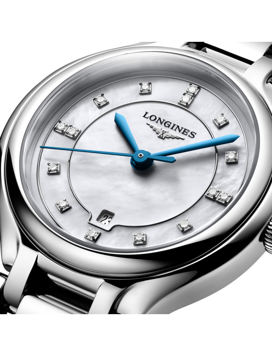 Side view of Longines PrimaLuna wristwatch with stainless steel case and bracelet, and white mother-of-pearl dial.