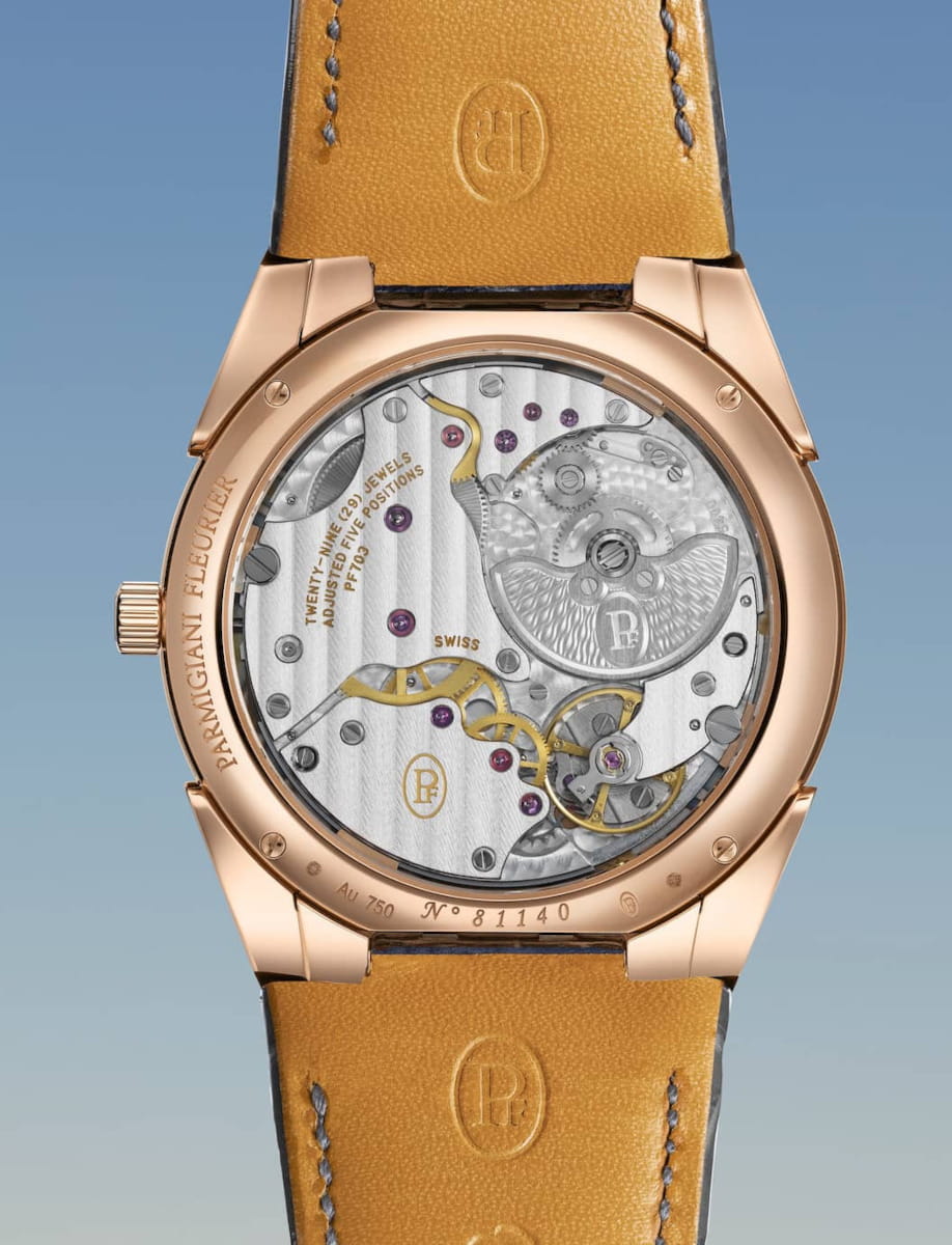 Back view of Parmigiani Fleurier Tonda PF Micro-Rotor wristwatch with 18k rose gold case, warm grey dial, and alligator strap.