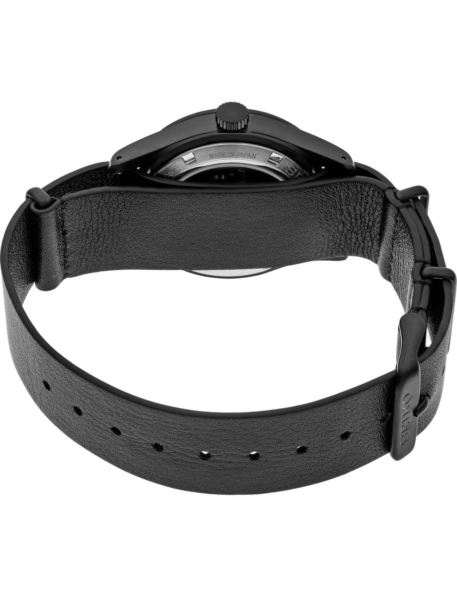 Back view of Seiko wristwatch with stainless steel case, black dial, and black cow leather strap.
