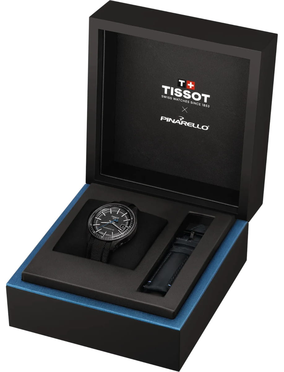 Box view of Tissot Pinarello wristwatch with 316L stainless steel & carbon case, grey dial, and black rubber strap.
