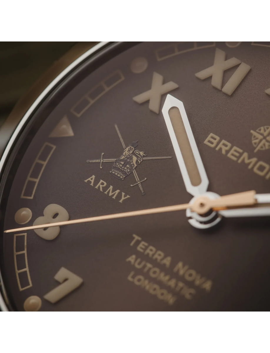 Close view of Bremont HMAF Terra Nova wristwatch with stainless steel case and bracelet, and gradient caramel California dial.