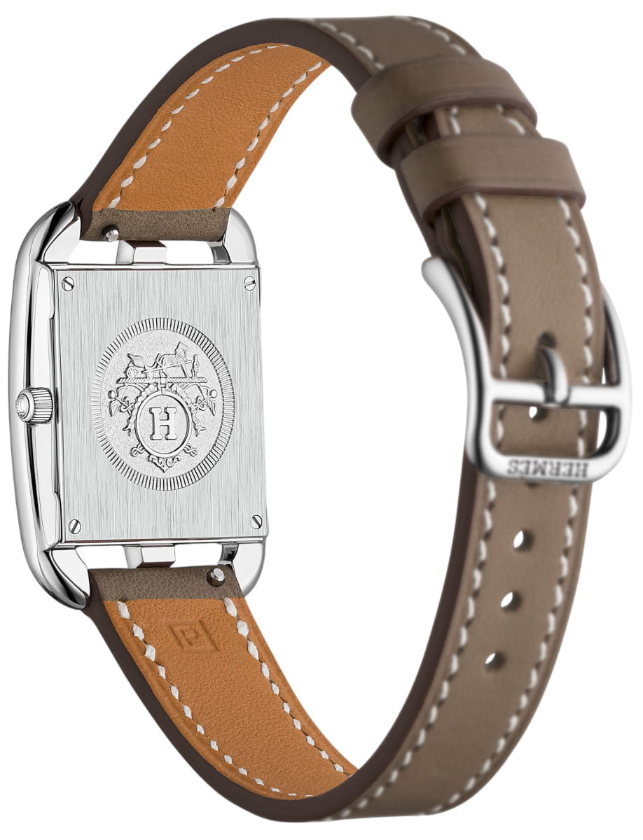 Side view of Hermes wristwatch with stainless steel case, white mother of pearl dial and calfskin leather strap