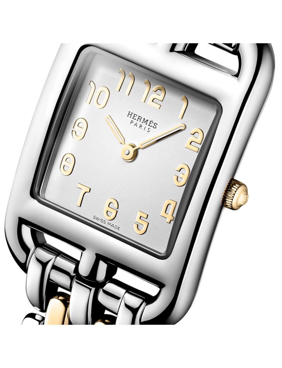 Close view of Hermes wristwatch with stainless steel case and bracelet and silver dial