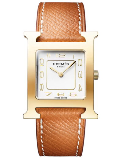 Hermes wristwatch with yellow gold plated steel case, silver dial and calfskin leather strap