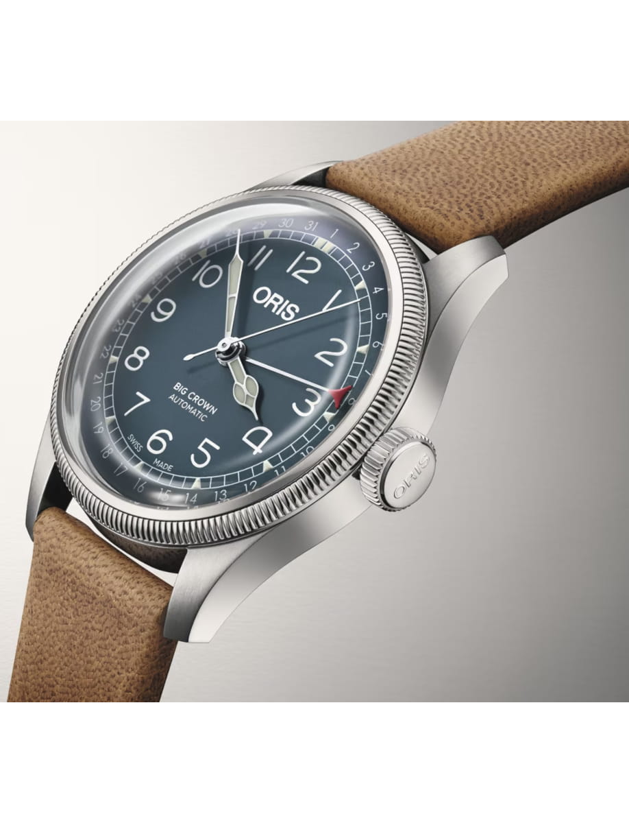 Oris Big Crown automatic wristwatch with a blue dial, silver case, and tan leather strap