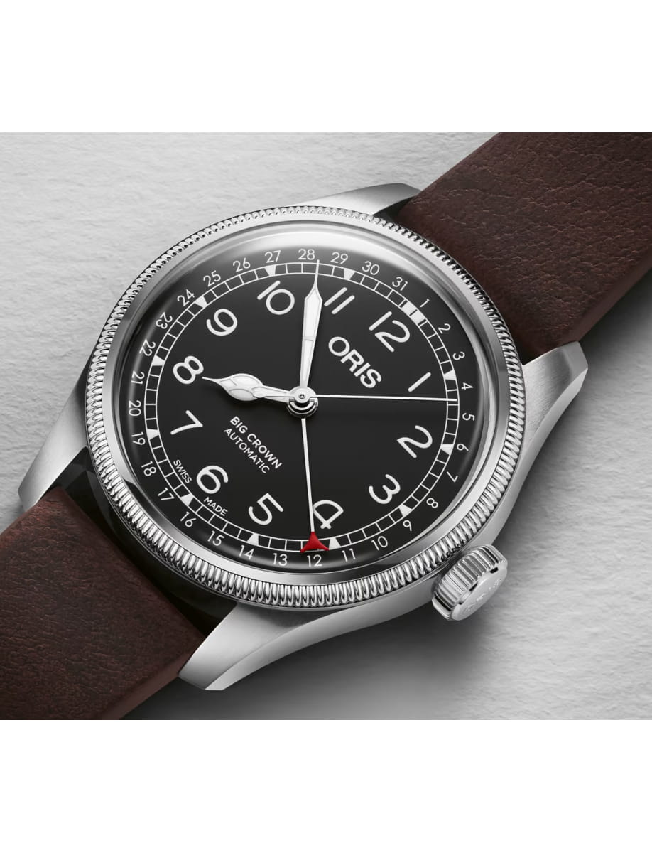 Oris Big Crown Automatic wristwatch with black dial, white numerals, silver case, and brown leather strap.