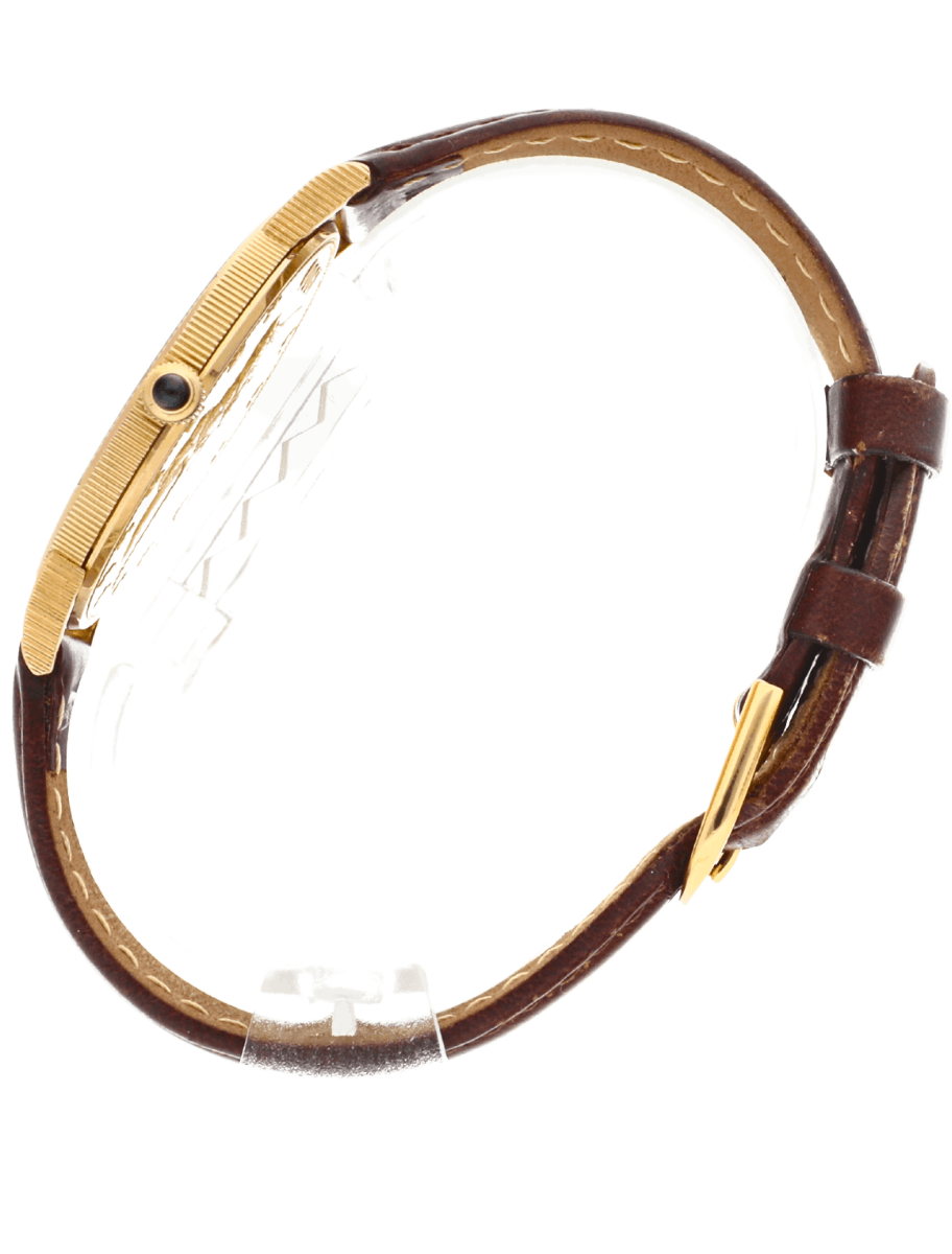 Pre-owned Corum gold-tone wristwatch with a brown leather strap shown from the side, crown visible on the case strap looped.