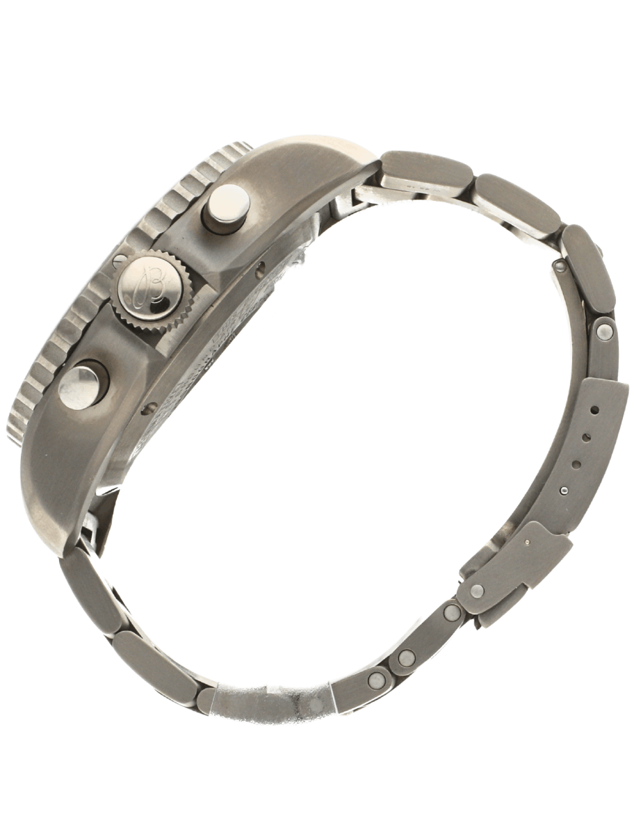 Side view of a stainless steel wristwatch with a metal link bracelet