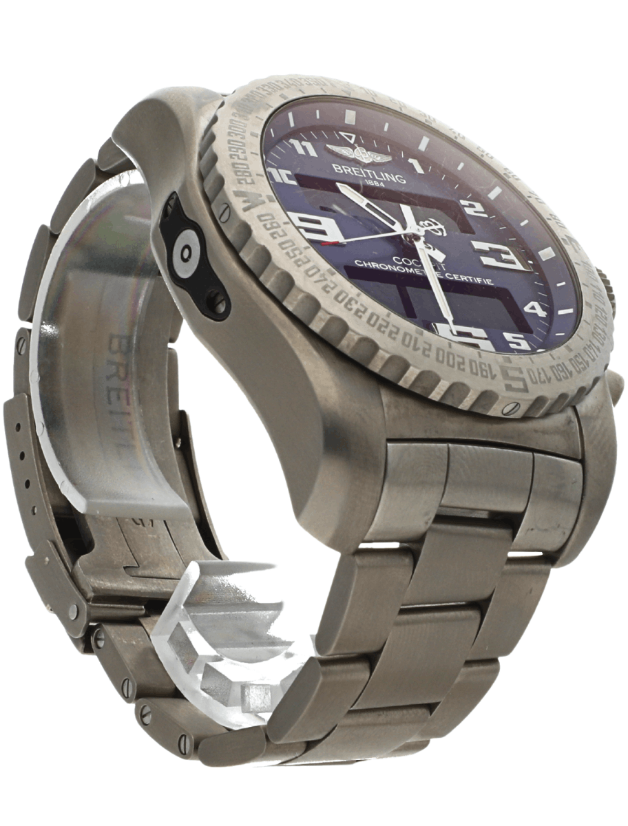 Close-up of a steel Breitling wristwatch with a blue dial and stainless steel bracelet, angled to show the bezel and crown edge.