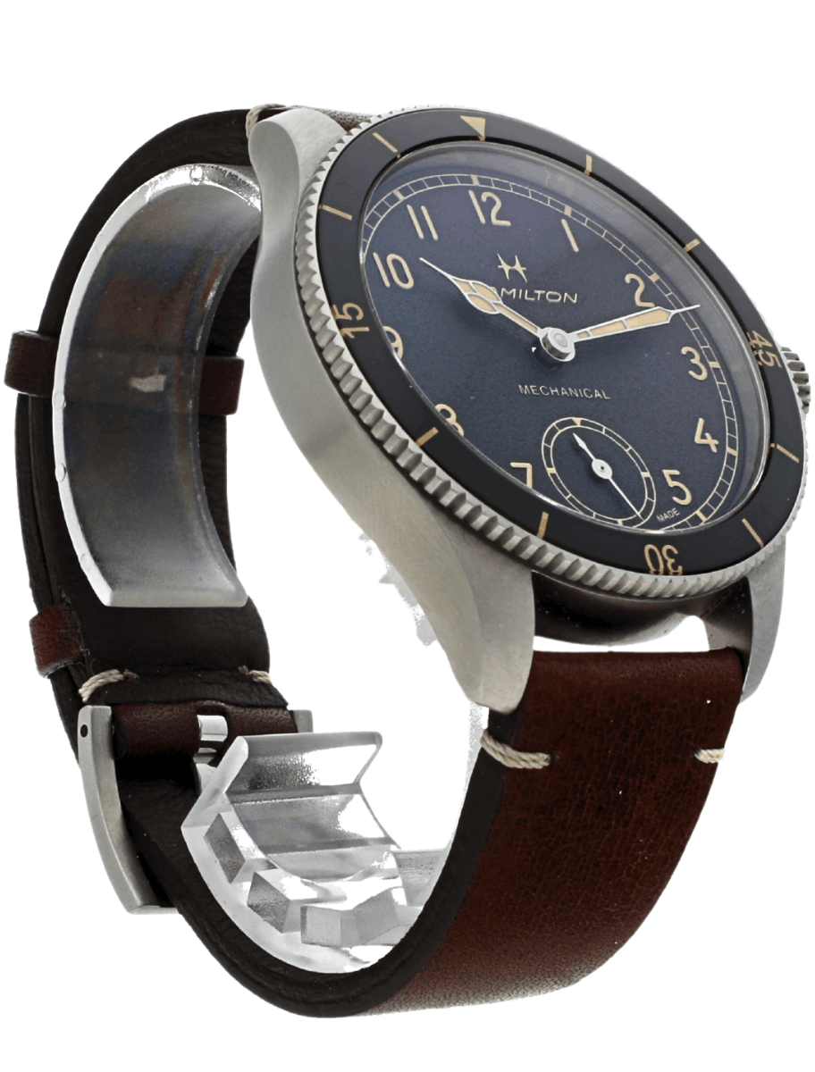 Pre-owned Hamilton with blue dial mechanical wristwatch with a brown leather strap and silver case.