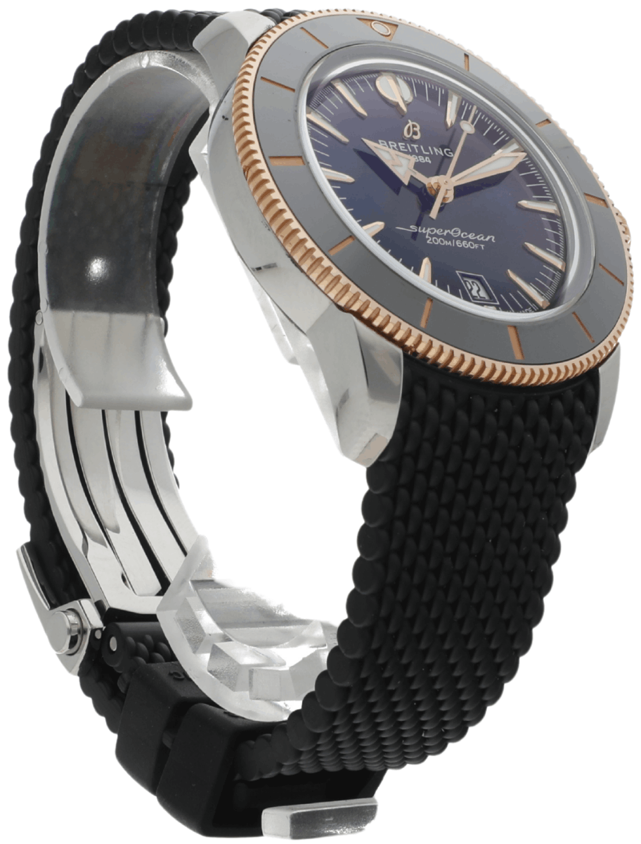 Breitling SuperOcean wristwatch with blue dial, two-tone bezel, stainless steel case, and black mesh strap short description for product page.